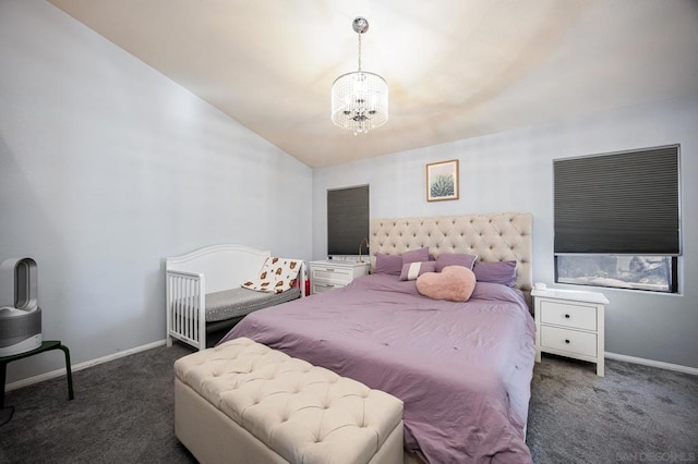 carpeted bedroom with an inviting chandelier and vaulted ceiling