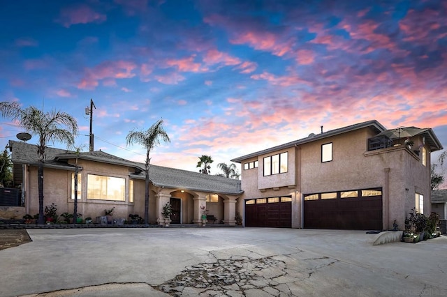 view of front of property with a garage