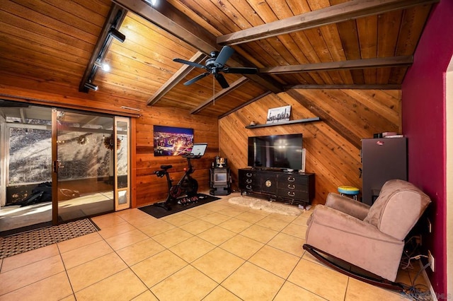 living room featuring wooden walls, lofted ceiling with beams, light tile patterned floors, track lighting, and wooden ceiling