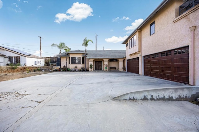 view of front of home with a garage