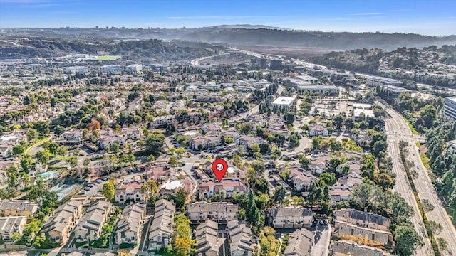 drone / aerial view featuring a mountain view