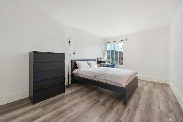 bedroom featuring light hardwood / wood-style floors