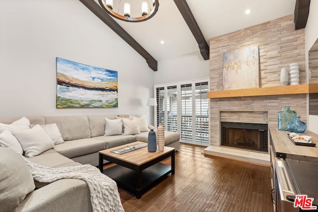 living room featuring beam ceiling, high vaulted ceiling, a notable chandelier, a fireplace, and hardwood / wood-style floors