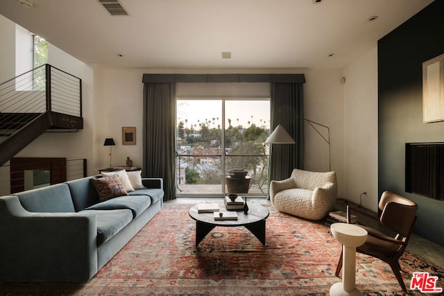 living room featuring a healthy amount of sunlight