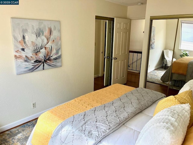 bedroom featuring wood-type flooring