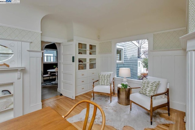 sitting room with light hardwood / wood-style flooring