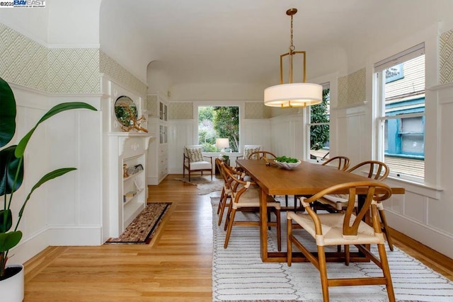 dining room with light wood-type flooring