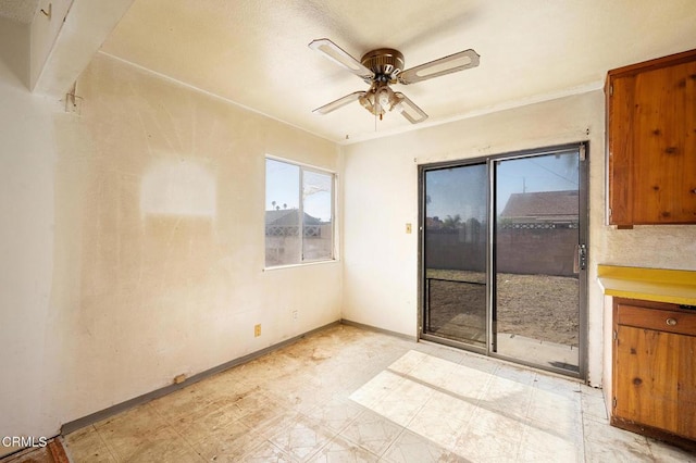 empty room featuring ceiling fan