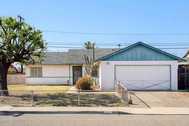 single story home featuring a garage