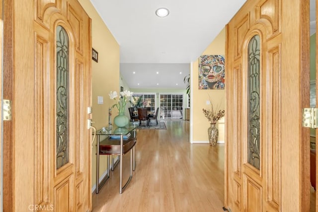 foyer entrance with wood-type flooring