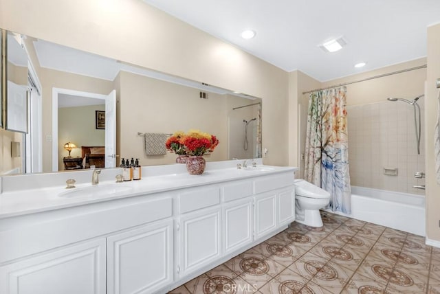 full bathroom with shower / bathtub combination with curtain, vanity, tile patterned flooring, and toilet