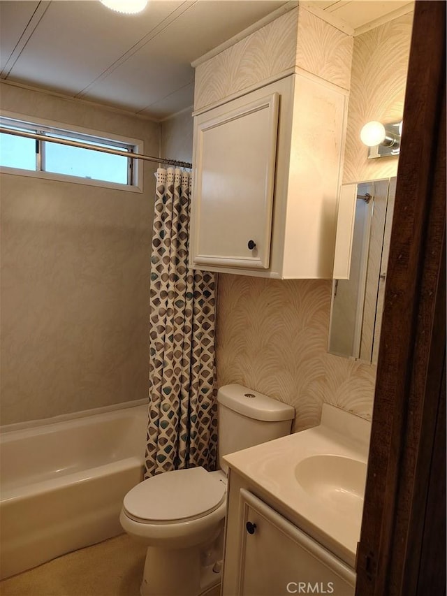 bathroom featuring toilet, shower / bath combo, vanity, and wallpapered walls