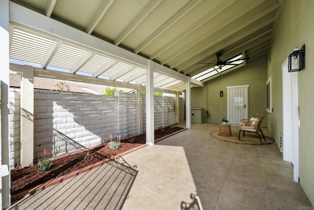 view of patio with fence and a pergola