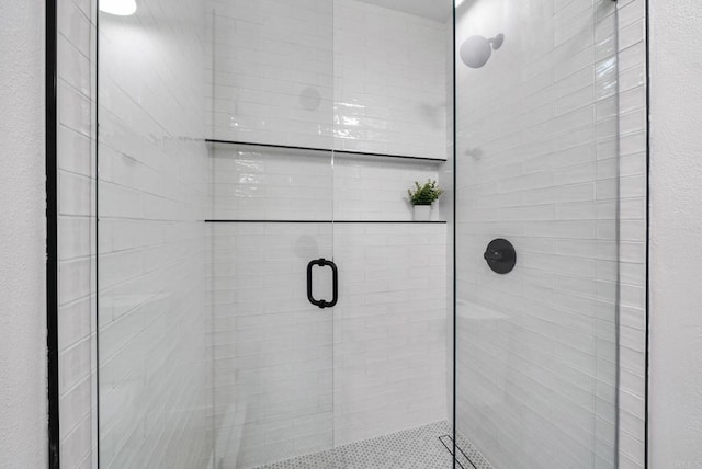 bathroom with a stall shower