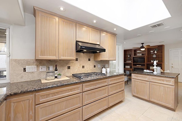 kitchen with stainless steel gas cooktop and light brown cabinets