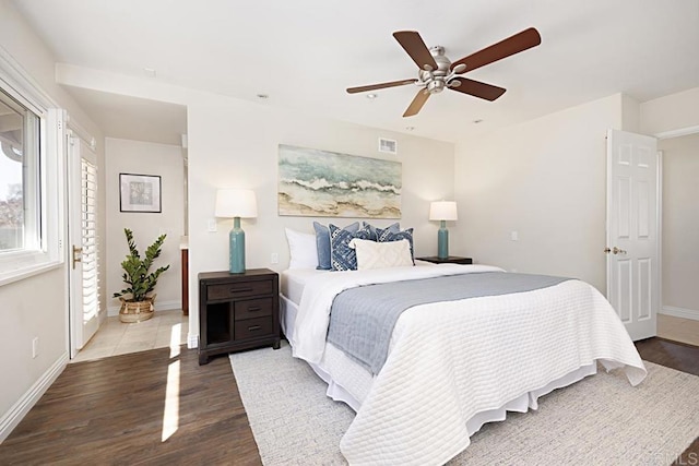 bedroom featuring hardwood / wood-style floors and ceiling fan