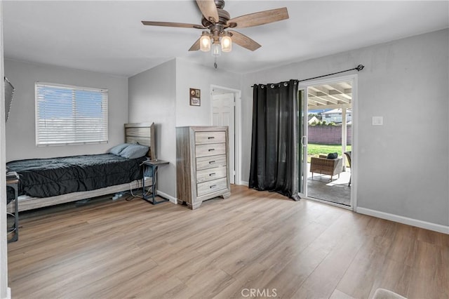 bedroom featuring ceiling fan, access to exterior, and light hardwood / wood-style flooring