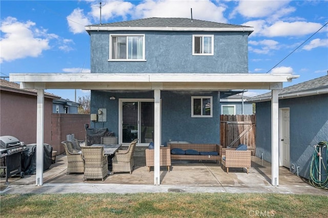 rear view of house with a patio area