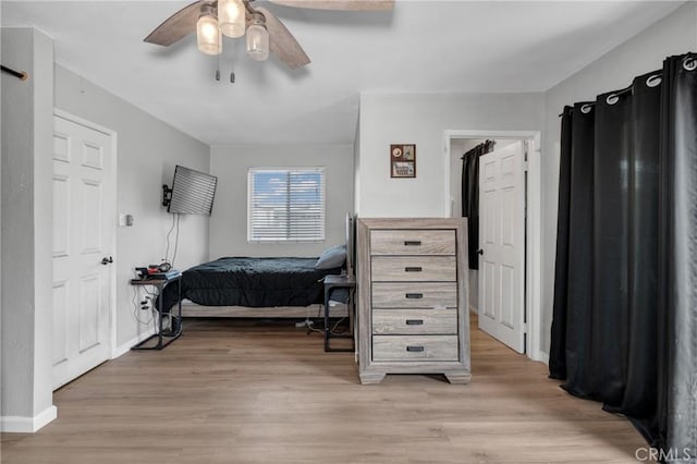 bedroom featuring ceiling fan and light wood-type flooring