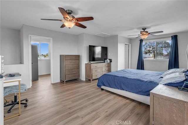 bedroom featuring ceiling fan and light wood-type flooring