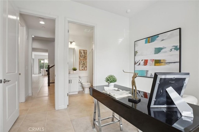 home office with light tile patterned flooring