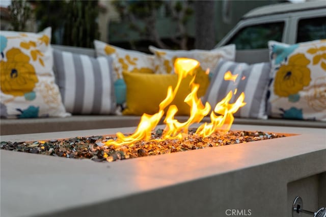 exterior details featuring a fire pit