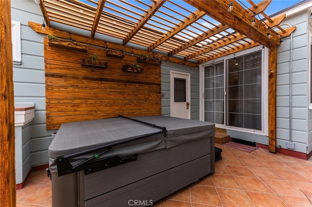 view of patio featuring a pergola and a hot tub