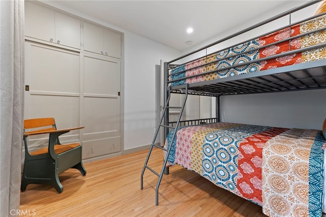 bedroom with light wood-type flooring