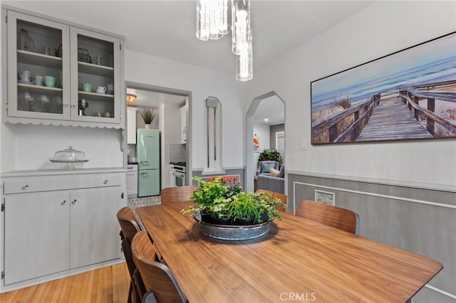 dining room with light wood-type flooring