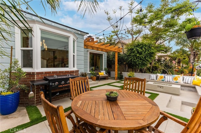 view of patio with a pergola and an outdoor living space with a fire pit