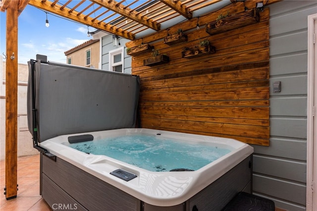 view of patio with a hot tub