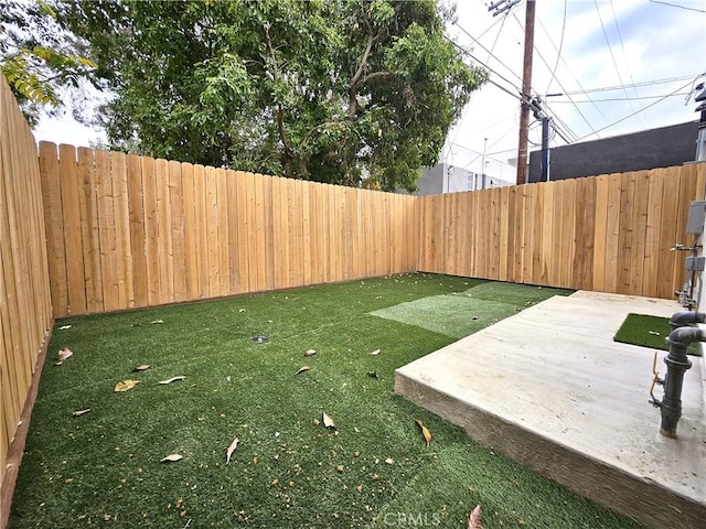 view of yard with a patio area