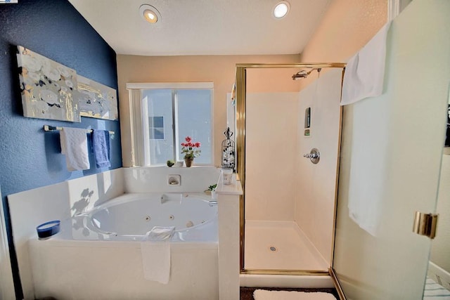 bathroom featuring plus walk in shower