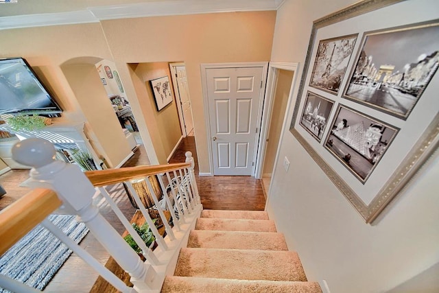 staircase with crown molding