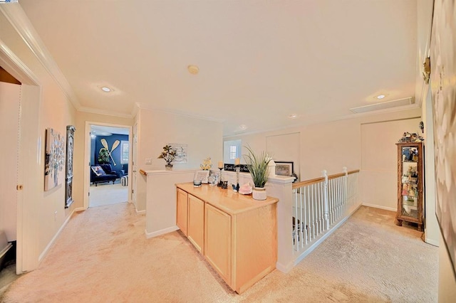 hallway with crown molding and light carpet