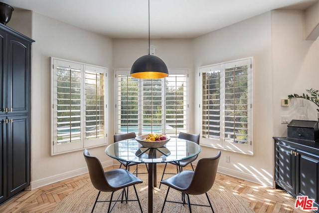 dining room with light parquet flooring