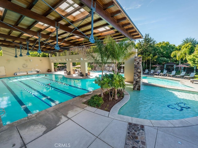 view of swimming pool with a patio