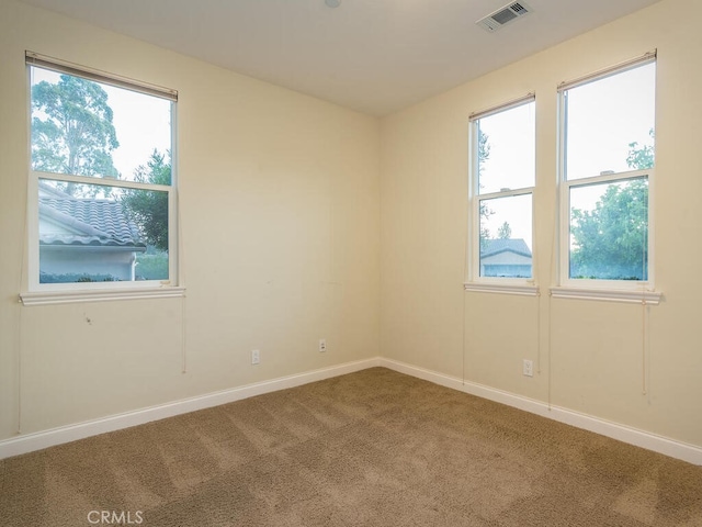 view of carpeted spare room