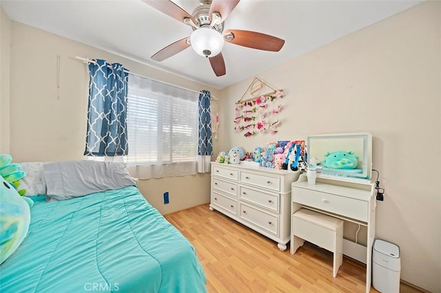 bedroom featuring ceiling fan and light wood-type flooring