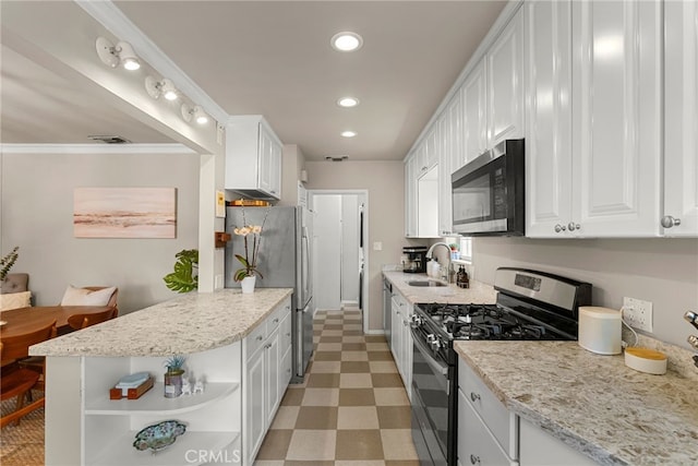 kitchen featuring white cabinetry, sink, crown molding, and stainless steel appliances