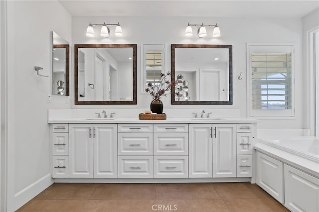 bathroom featuring vanity and tile patterned flooring