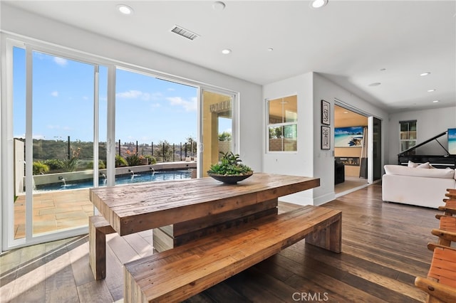 dining room with hardwood / wood-style floors