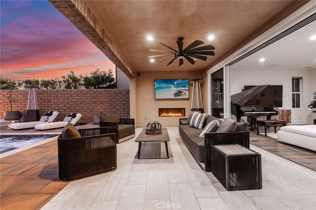 view of patio / terrace featuring an outdoor hangout area and ceiling fan