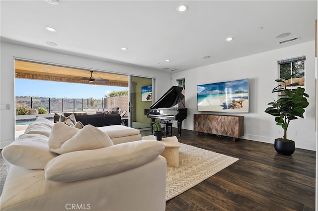 living room with dark hardwood / wood-style flooring