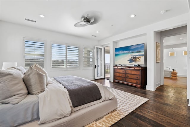 bedroom featuring access to outside and dark hardwood / wood-style floors