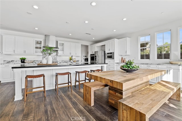 dining space with dark wood-type flooring