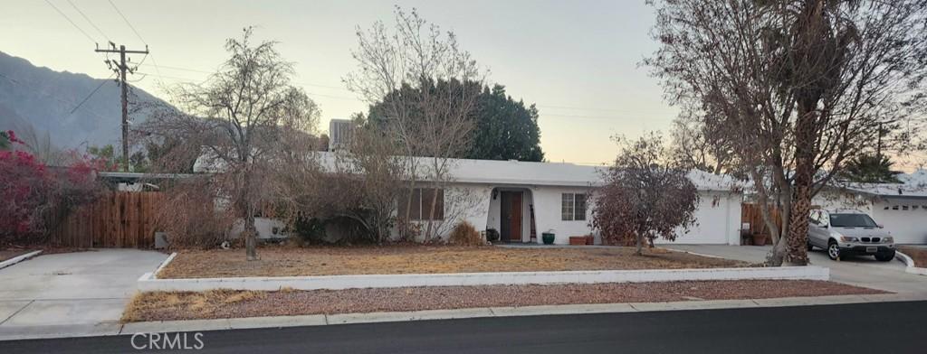 ranch-style house featuring a garage