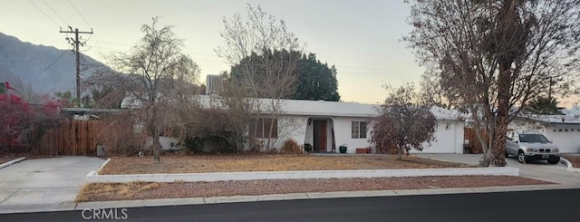 single story home featuring driveway