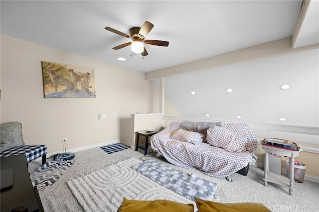 carpeted living room featuring ceiling fan