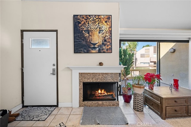 tiled living room with a premium fireplace